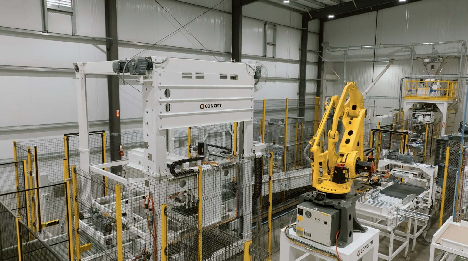 Concetti packaging line with robotic palletizer at Texas Rice Milling