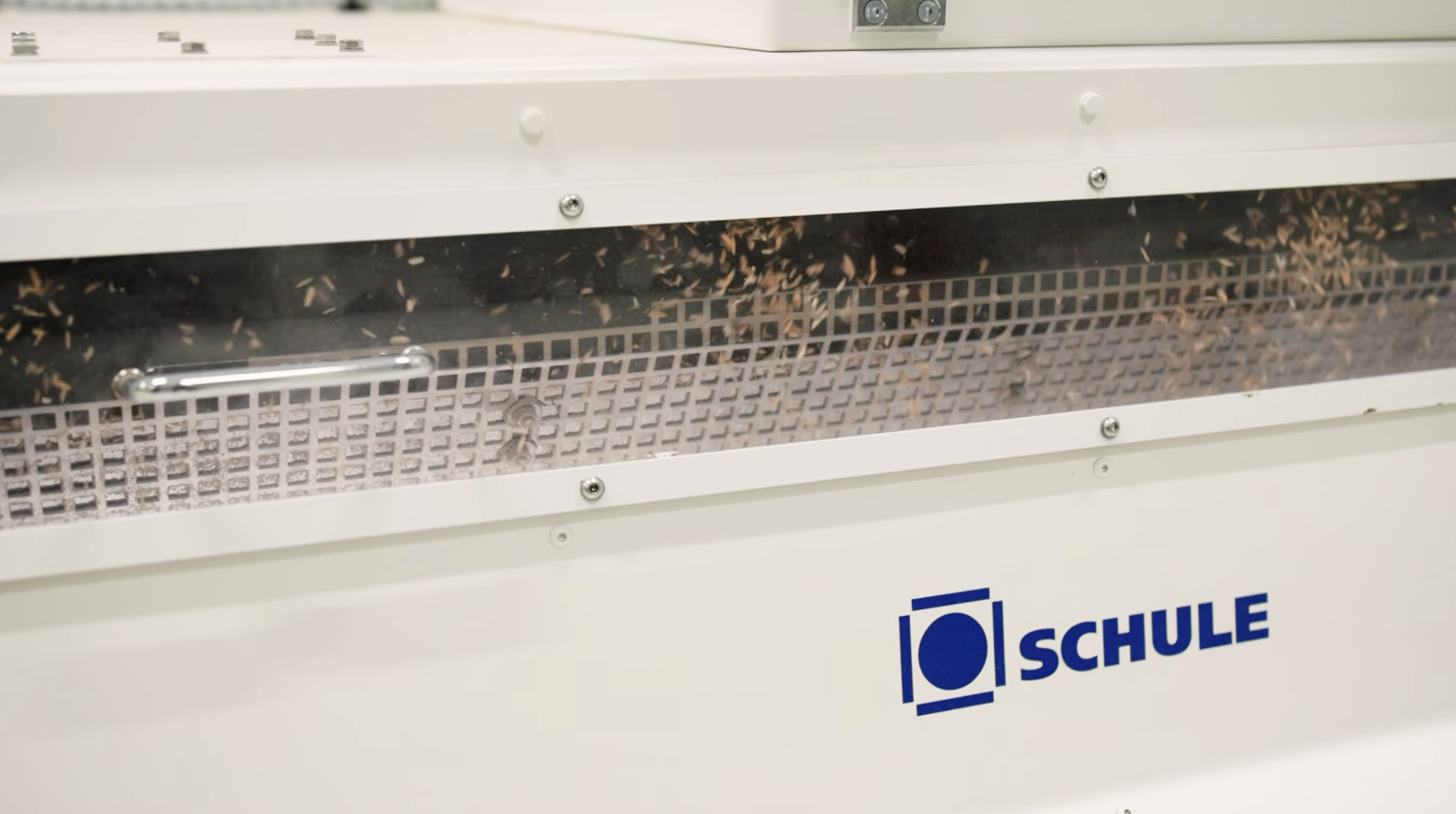 Rice moving through Schule milling equipment at Texas Rice Milling