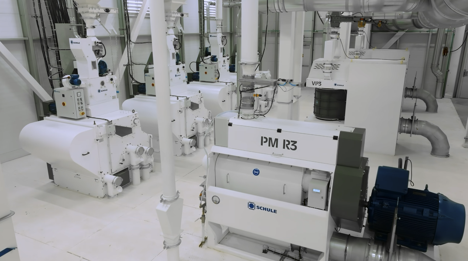 Schule rice polishers in the Texas Rice Milling milling room