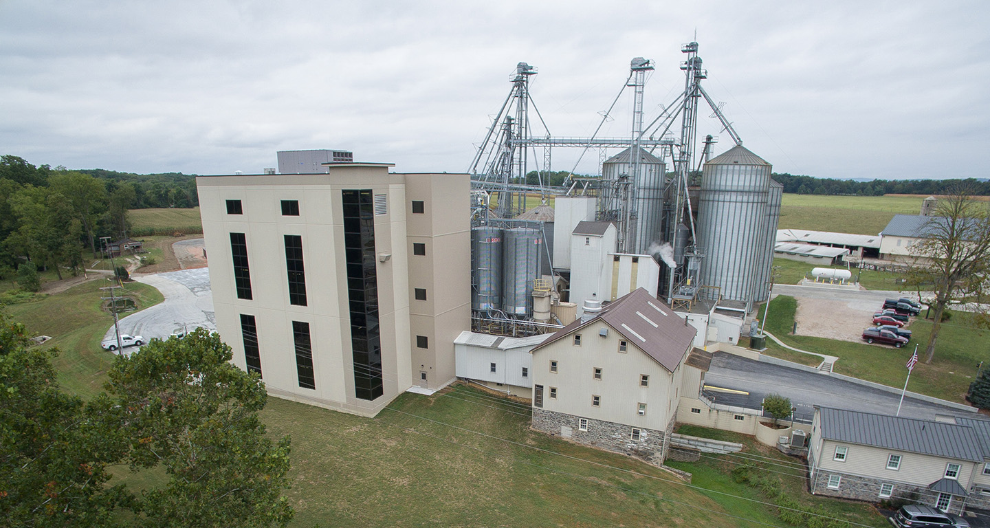 Image of the original and new flour mills at Ag Com, Inc.